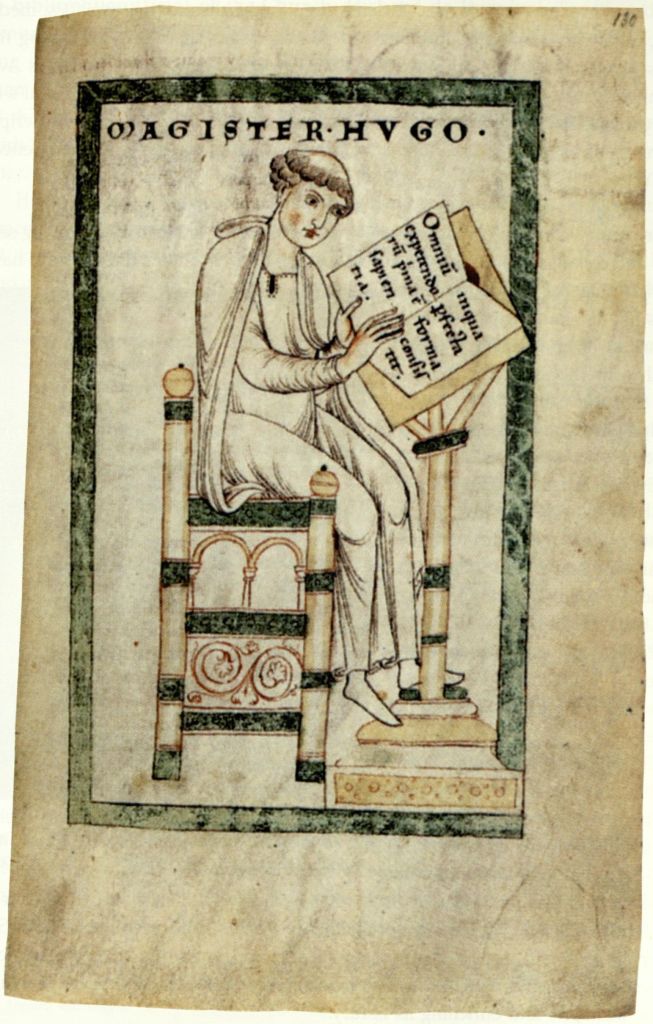 A medieval miniature labelled MAGISTER HUGO: Hugh of St. Victor seated on a carved chair, holding an open book.