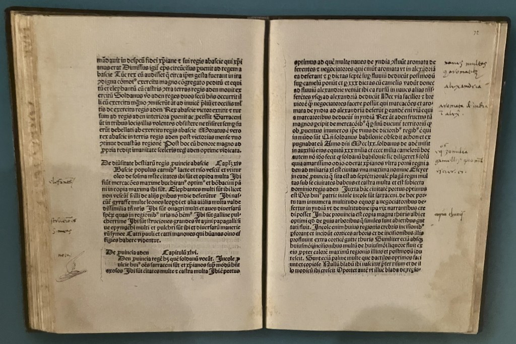 A printed page of Marco Polo's travels with handwritten notes in the margins by Christopher Columbus.