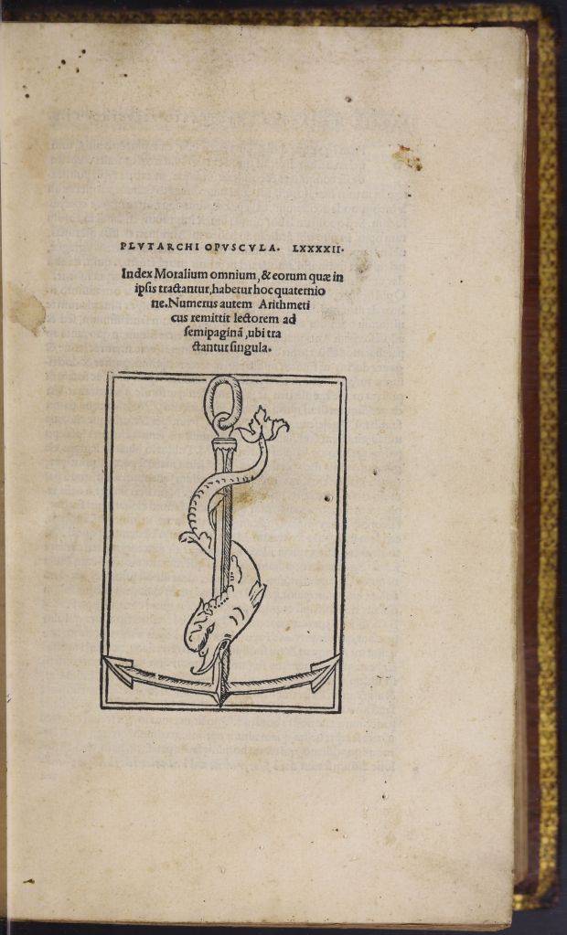 A plain title page with a few lines of Latin above the Aldine printer's mark: a dolphin wound around an anchor.