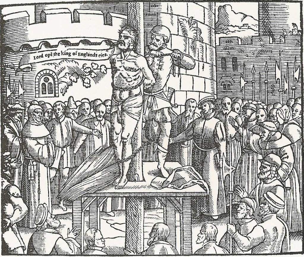 A woodcut of William Tyndale bound to a stake above a crowd, with a banner reading “Lord open the King of Englands eies.”